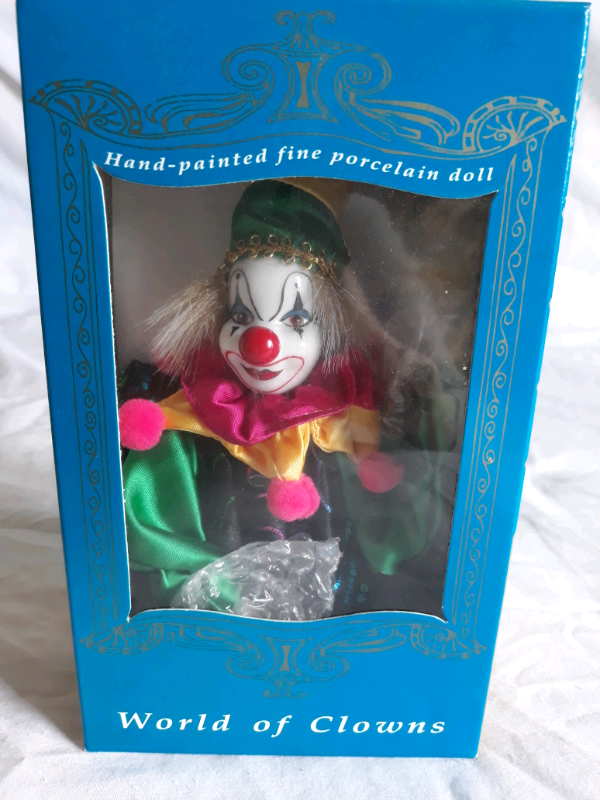 world of clowns porcelain doll